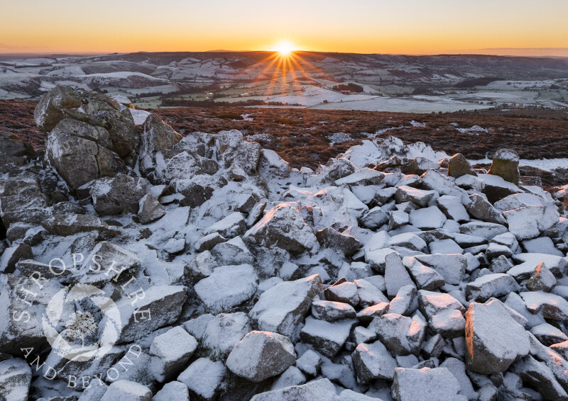Sunrise over the Long Mynd, seen from Saddle Rock on the Stiperstones, Shropshire.