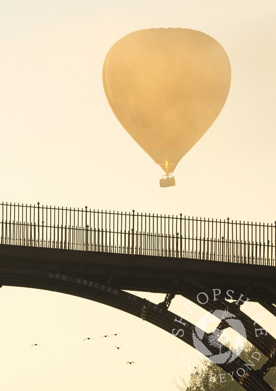 Hot air balloon over the Iron Bridge, in Ironbridge, Shropshire.