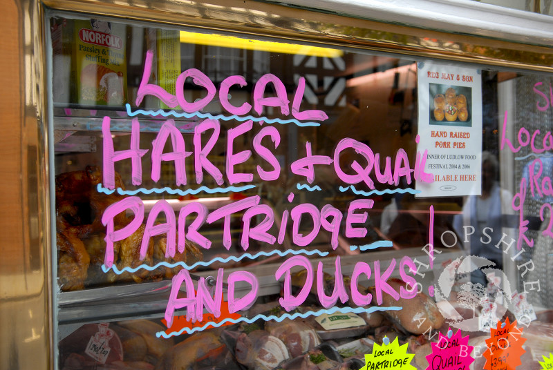 Reg May & Son's butchers shop window in Ludlow, Shropshire, England.