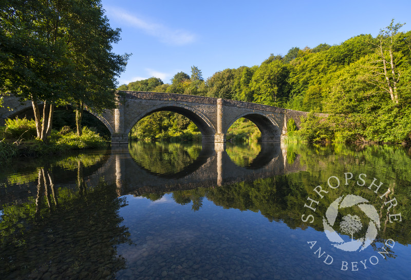 Dinham Bridge reflected in the River Teme, Ludlow, Shropshire.