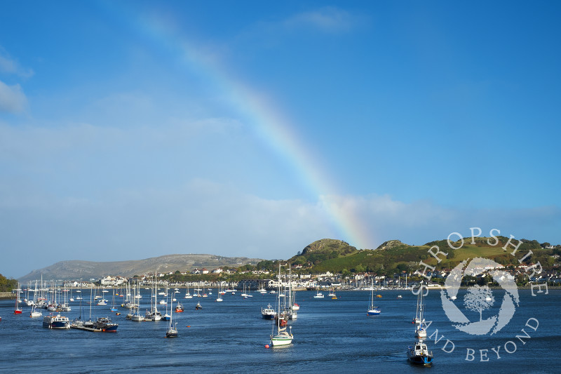 Rainbow over Conwy Bay, looking to Deganwy, Wales.