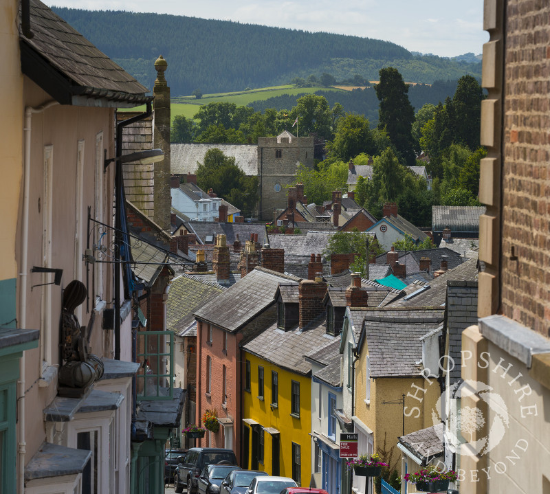 The view down High Street looking towards the Church of St John the Baptist in Bishop's Castle, Shropshire, England.