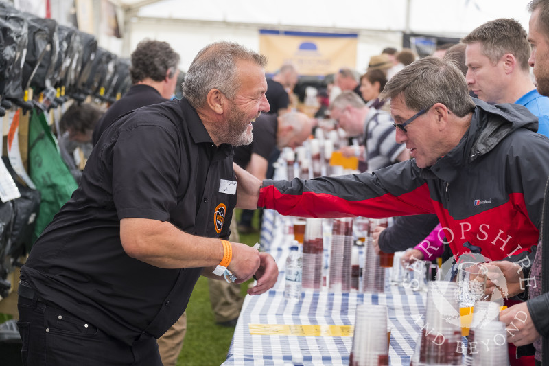 Bar staff and visitors enjoying themselves in the Festival Pub at the Ludlow 2017 Spring Festival.