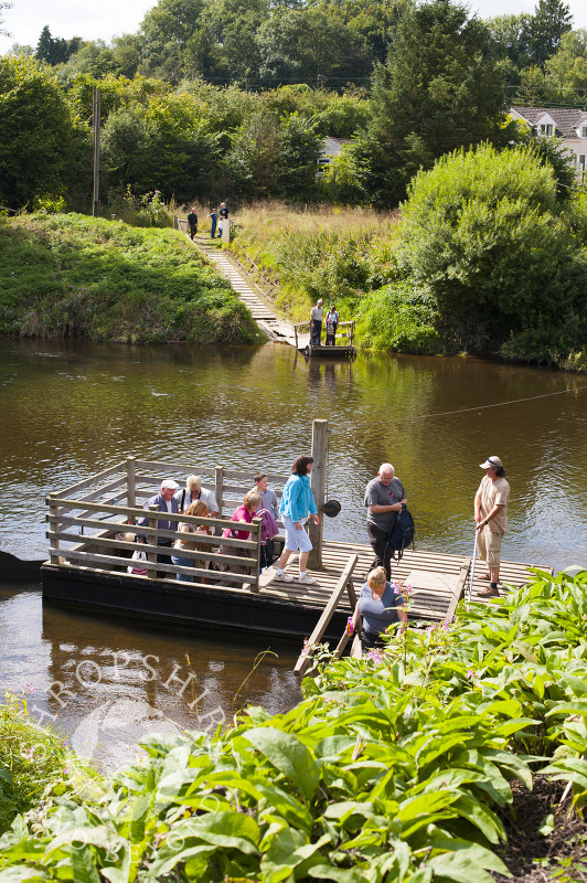 Passengers disembark after crossing the River Severn by ferry at Hampton Loade near Bridgnorth, Shropshire.