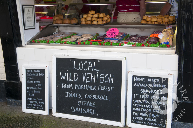 A butcher's shop during Ludlow Food Festival, Shropshire, England.