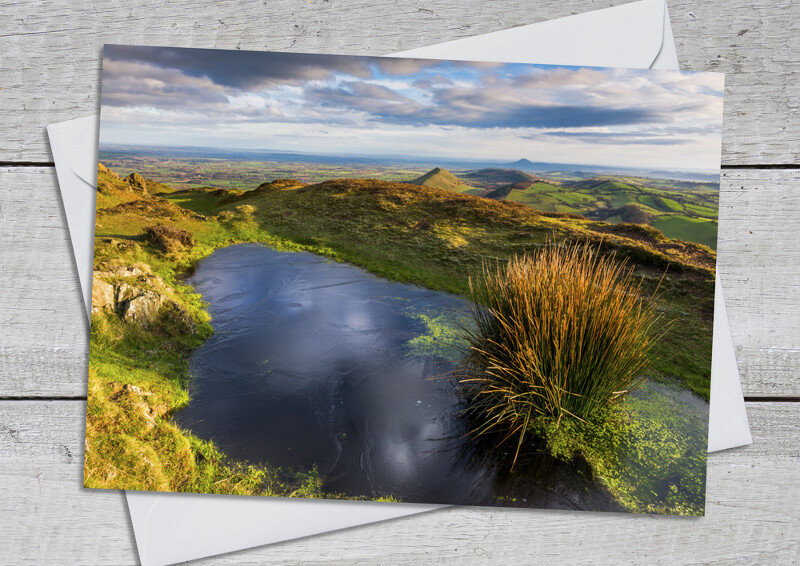 Frozen pond on Caer Caradoc, near Church Stretton, Shropshire.