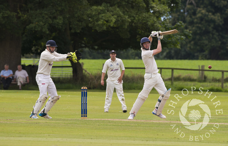 A cricket match in progress at Davenport Park, Worfield, Shropshire. Members of Streetly Cricket Club are seen batting against Worfield.