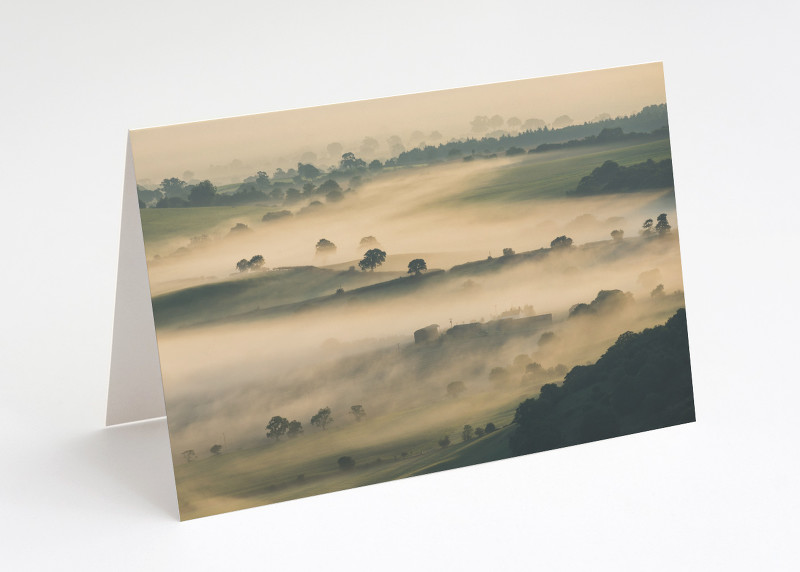 Morning mist over Shropshire seen from the Stiperstones.