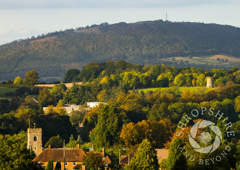 Holy Trinity Church at Much Wenlock, with the Wrekin, Shropshire.