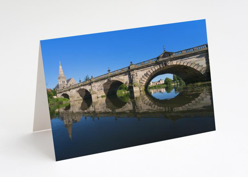 English Bridge reflected in the River Severn, Shrewsbury, Shropshire.