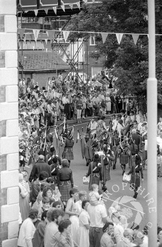 The annual carnival procession makes its way into Market Place, Shifnal, Shropshire, in June 1987.