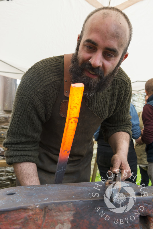 Joel Black creating one of his kitchen knives at Ludlow Spring Festival.