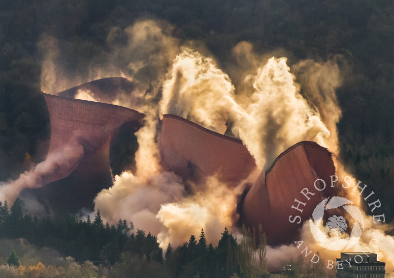 The demolition of Ironbridge Power Station cooling towers, seen from the Wrekin, Shropshire.