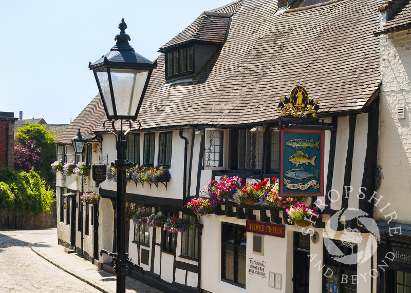 The 16th century Three Fishes Inn in Fish Street, Shrewsbury, Shropshire.