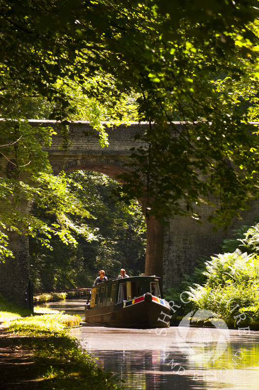 A narrowboat on the Shropshire Union Canal at Brewood, Staffordshire, England.