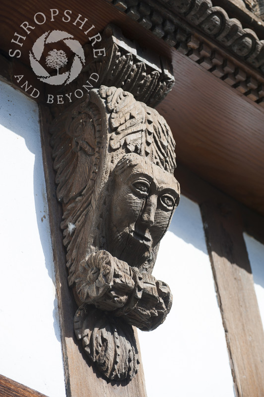 Carved wooden corbel on a building in Broad Street, Ludlow, Shropshire, England.