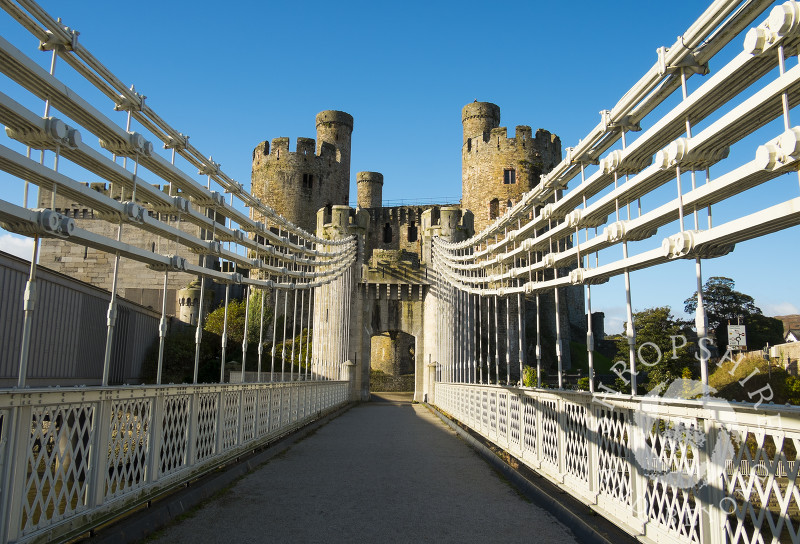 Medieval Conwy Castle and suspension bridge in Conway, North Wales.