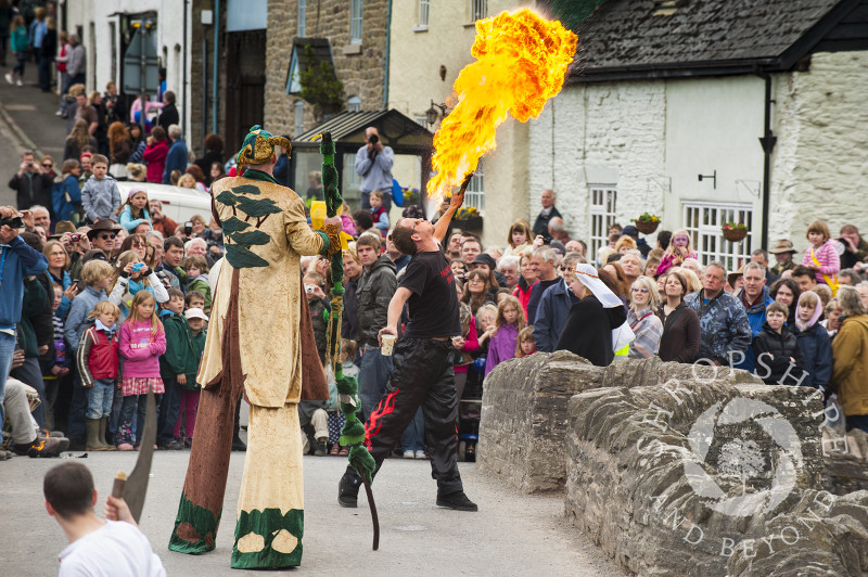 A fire-eater performs at the Green Man Festival, Clun, Shropshire.