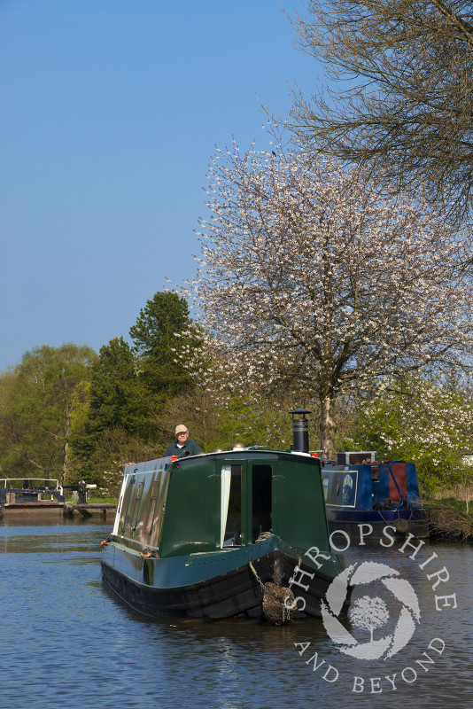 A canal boat on the Trent and Mersey canal near Fradley Junction, Staffordshire, England.