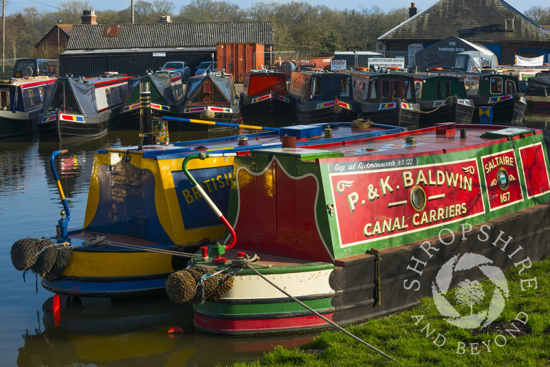 Canal boats moored at Norbury Junction on the Shropshire Union Canal, Staffordshire, England.