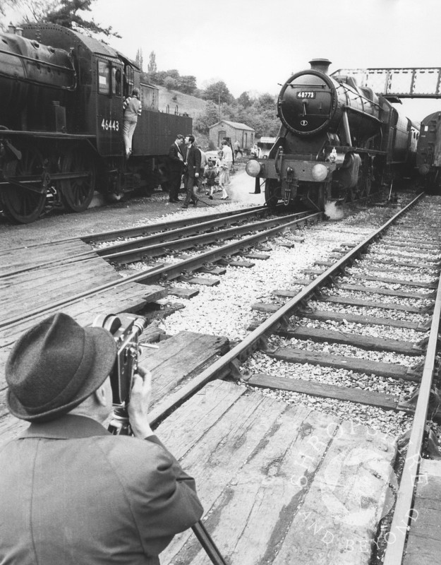 Steam locomotives LMS Stanier Class 8F 48773 and Ivatt Class 46443 seen at Bridgnorth Station on the Severn Valley Railway line, Shropshire, 1968.