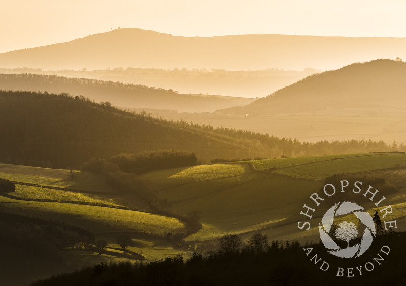 Sunrise over Titterstone Clee Hill, seen from Bury Ditches Iron Age hill fort, Shropshire.