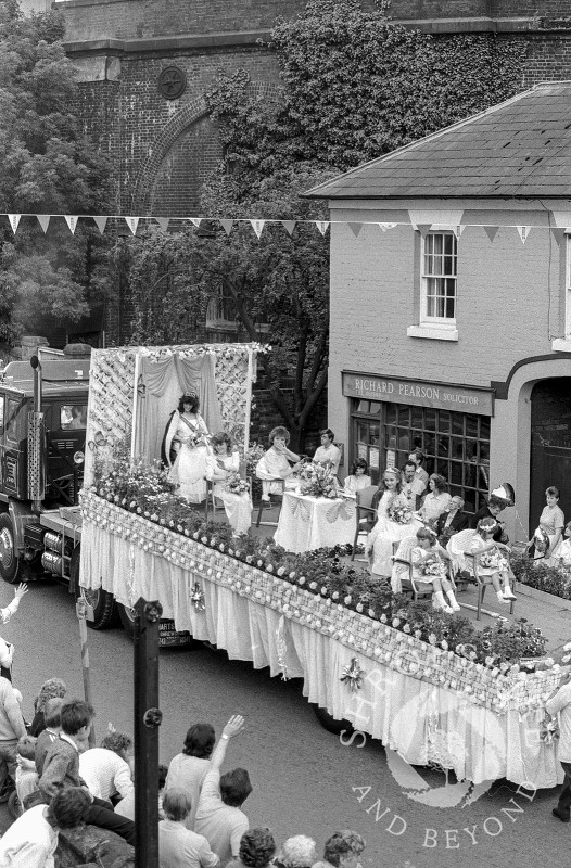 The Carnival Queen's float in Victoria Road, Shifnal, Shropshire, during the annual parade in June 1987.