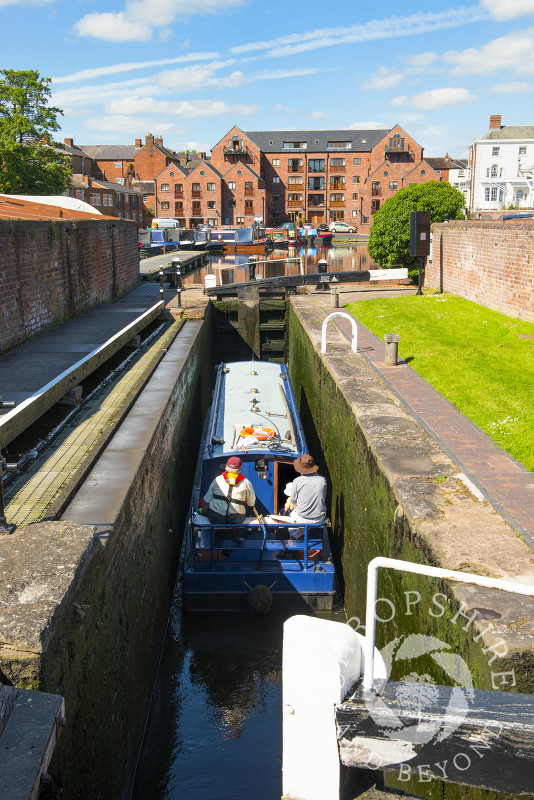 A narrowboat in a lock at the canal basin, Stourport-on-Severn, Worcestershire, England.