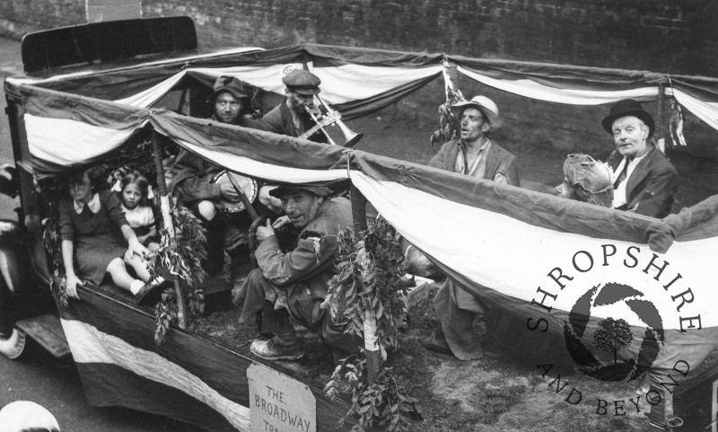 The Broadway Tramps in Church Street, Shifnal, Shropshire, during the town's carnival procession in the 1950s.