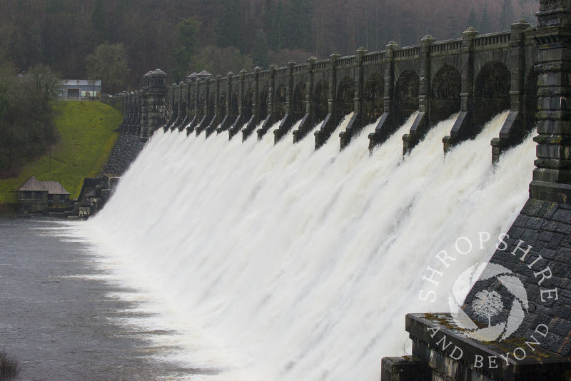 Water flowing over the dam at Lake Vyrnwy in winter, Montgomeryshire, Powys, Wales.