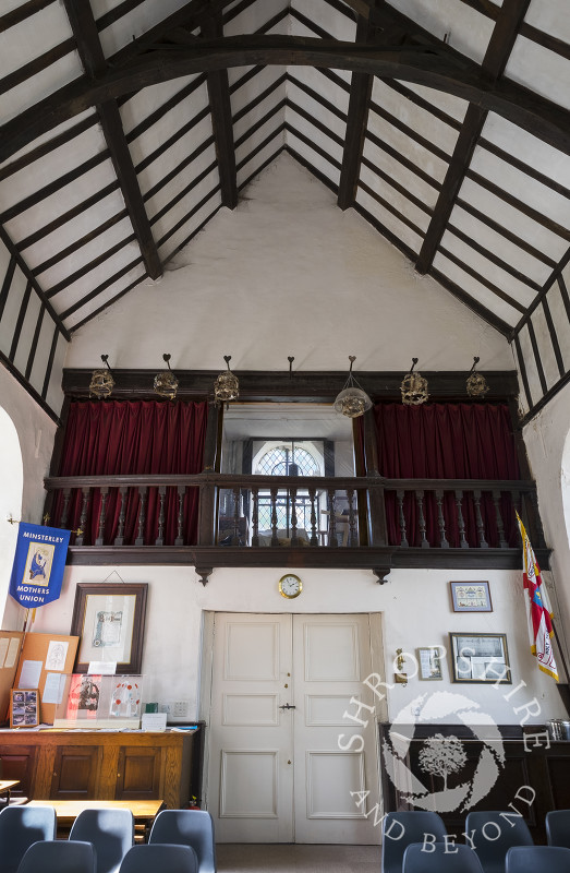 Maiden's garlands hang over the west gallery at Holy Trinity Church in Minsterley, Shropshire.