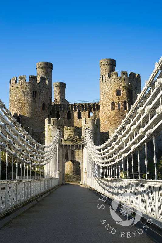 Medieval Conwy Castle and suspension bridge in Conway, North Wales.