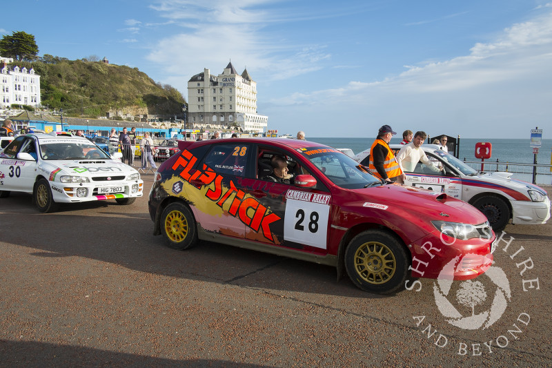 Cambrian Rally competitors on the seafront at Llandudno, Wales.