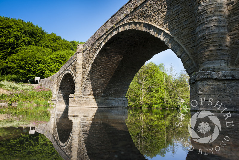 Dinham Bridge reflected in the River Teme at Ludlow, Shropshire, England.