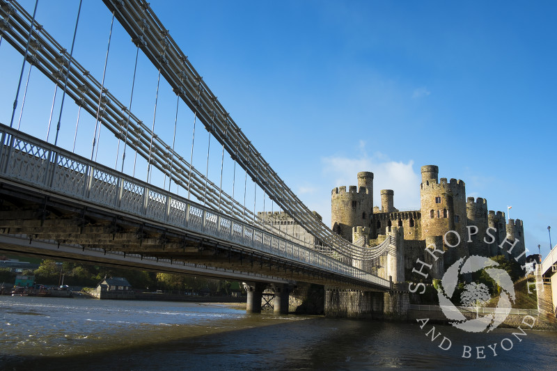 Medieval Conwy Castle and suspension bridge in Conway, North Wales.