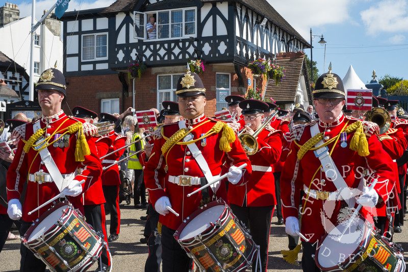 The Yorkshire Volunteers Band marches through the Quarry at Shrewsbury Flower Show, Shropshire.
