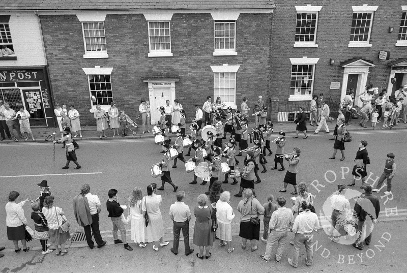 A marching band in Victoria Road during the carnival parade at Shifnal, Shropshire, in June 1987.