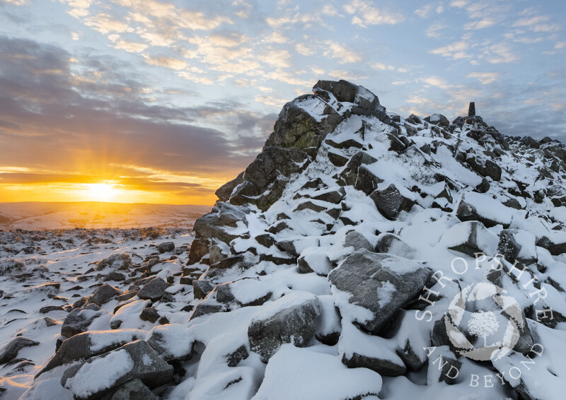 Sunrise over the Long Mynd, seen from Manstone Rock on the Stiperstones, Shropshire.