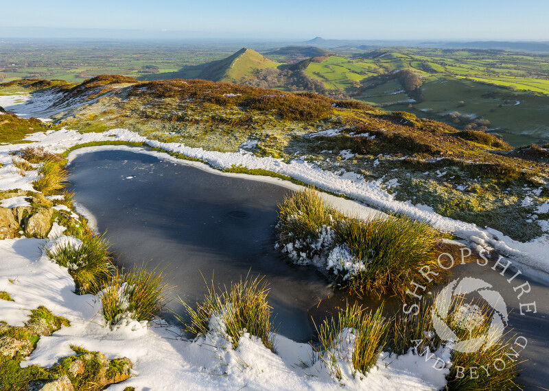 Snow and ice on the summit of Caer Caradoc, Church Stretton, Shropshire.