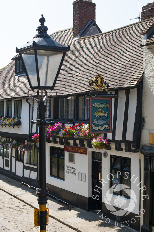 The 16th century Three Fishes Inn in Fish Street, Shrewsbury, Shropshire, England.