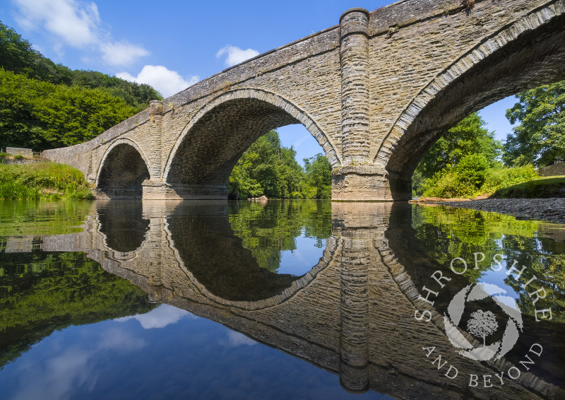 Dinham Bridge reflected in the River Teme at Ludlow, Shropshire.