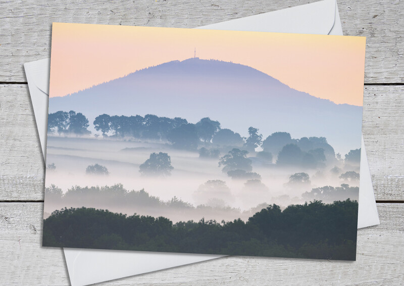 Sunrise over the Wrekin seen from Wenlock Edge, Shropshire.