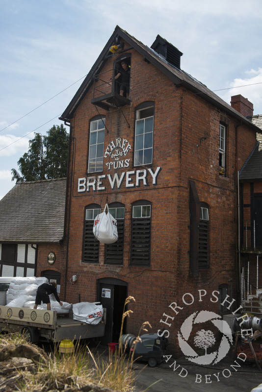 Sacks of malt being delivered to the Three Tuns Brewery in Bishop's Castle, Shropshire, England.