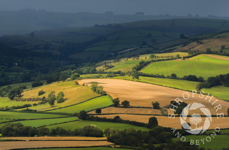 Dark clouds herald an approaching shower in the Clun Valley, Shropshire.