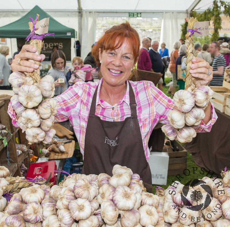 Caroline Stenning of the French Flavour garlic stall at Ludlow Food Festival, Shropshire.