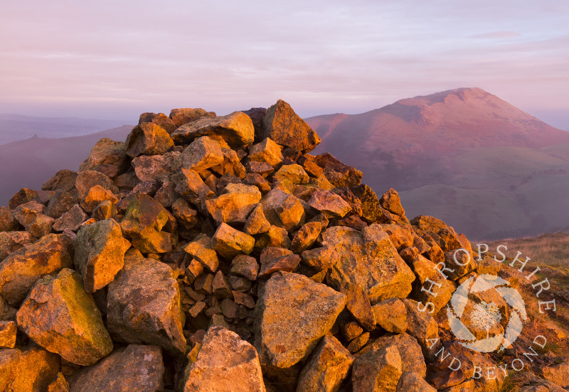 Sunrise on Hope Bowdler Hill, looking to Caer Caradoc, Shropshire.