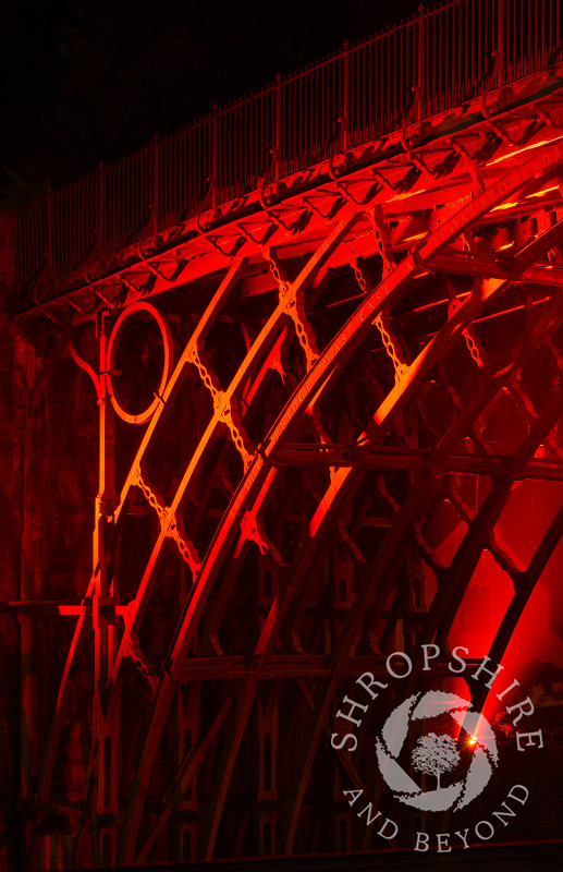 A view of the Iron Bridge at Ironbridge, Shropshire, England. It was illuminated as part of the Night of Heritage Light, celebrating UNESCO world heritage sites.