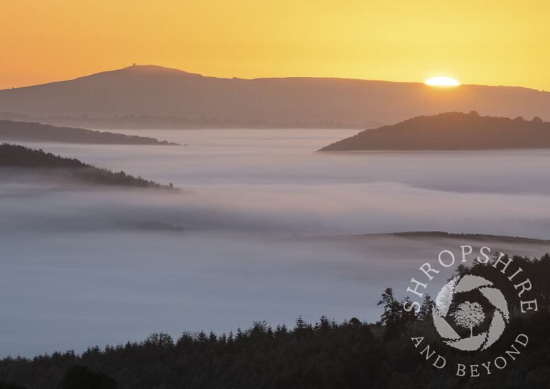 Sunrise over Titterstone Clee and the Clun Valley, seen from Bury Ditches, Shropshire.