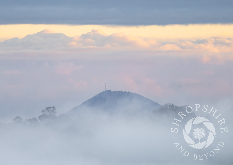 Misty sunrise over the Wrekin, seen from Hill End, Shropshire.