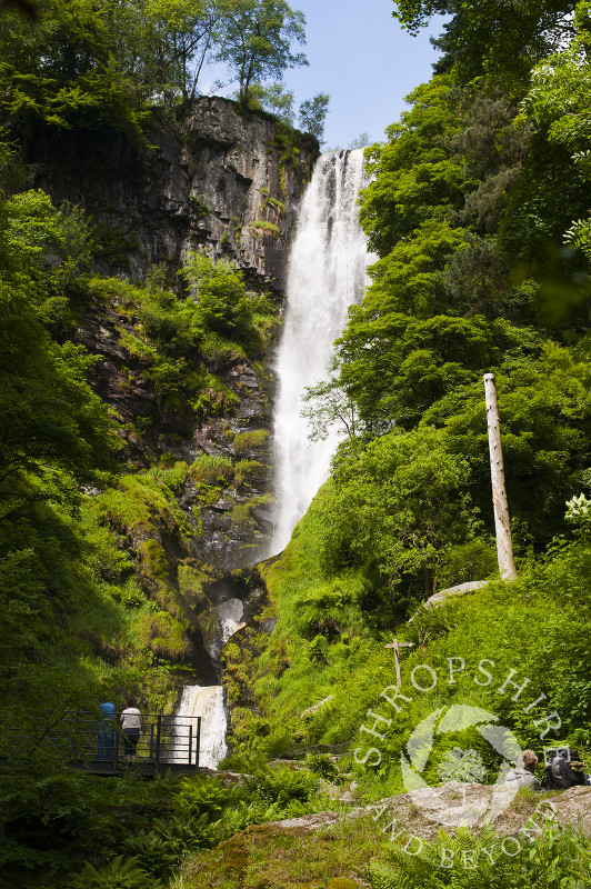 Water tumbles down Pistyll Rhaeadr waterfall in the Berwyn Mountains, Powys, Wales.